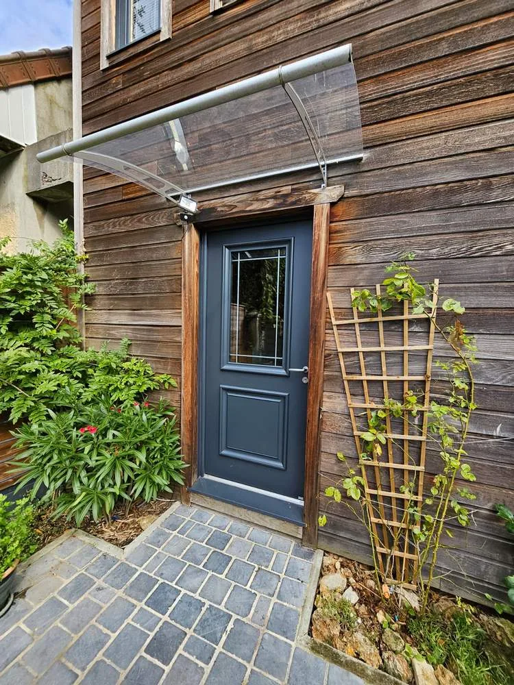 Rénovation à Franconville (95) : pose d'une porte d'entrée mixte bois-alu Bel'M