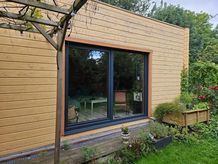 Réalisation à Montesson : Installation d’une baie vitrée mixte bois-aluminium Internorm HF 410 — photo 2